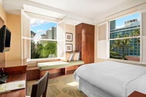 Postel nebo postele na pokoji v ubytování Moana Surfrider, A Westin Resort & Spa, Waikiki Beach
