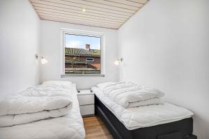 Ένα ή περισσότερα κρεβάτια σε δωμάτιο στο Nrregade 18, 9600 Aars