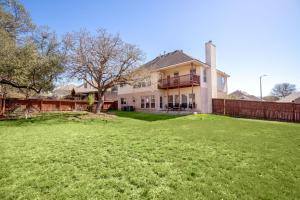 a large yard in front of a house at Sleep on the Cloud - 5 Bedrooms - Corner Lot in San Antonio