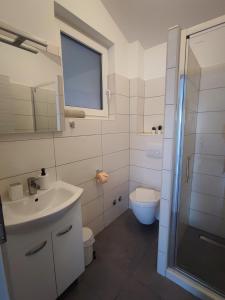 Koupelna v ubytování Apartmani Plaža