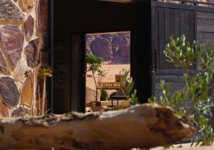 a doorway to a building with a view of the desert at Rum Planet Camp in Wadi Rum