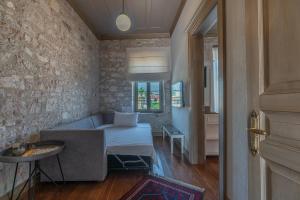 Postel nebo postele na pokoji v ubytování Elia Hotel Cunda by Ortunc