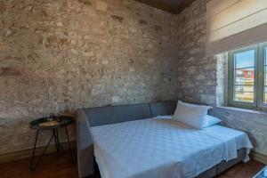 Postel nebo postele na pokoji v ubytování Elia Hotel Cunda by Ortunc