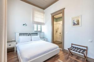 Postel nebo postele na pokoji v ubytování Elia Hotel Cunda by Ortunc