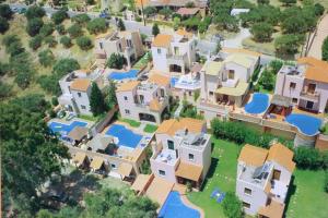 an aerial view of a large house with a pool at Nine Muses Villas - Clio Terpischori in Hersonissos