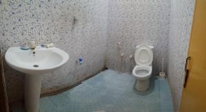 Kylpyhuone majoituspaikassa Oshee Home