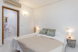 Posteľ alebo postele v izbe v ubytovaní Fidalsa Golf & Beach