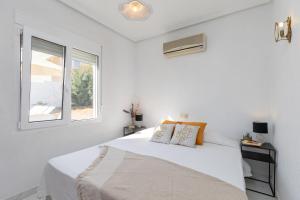 Posteľ alebo postele v izbe v ubytovaní Fidalsa Golf & Beach + 28 fotografií