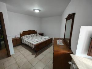 Tempat tidur dalam kamar di Il BORGOIN