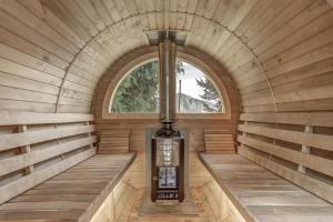 an inside view of a sauna with a window at Chalet les Bubus in La Tzoumaz