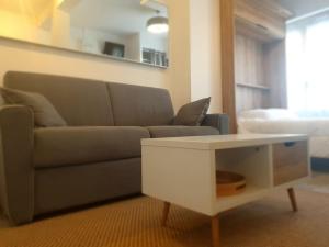 Posezení v ubytování Charmant Studio en centre-ville de Luchon