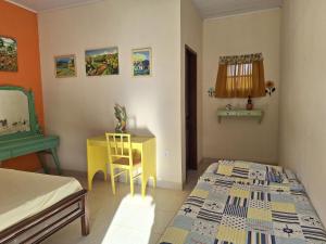 Katil atau katil-katil dalam bilik di Casa na Praia com Piscina