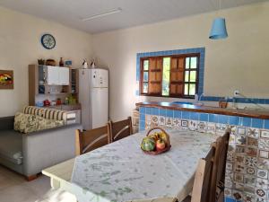 Dapur atau dapur kecil di Casa na Praia com Piscina