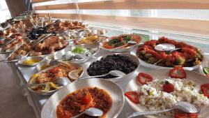 a buffet of different types of food on a table at Hotel Labella Bergama in Bergama