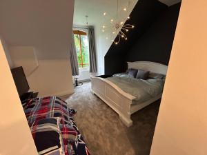 Una cama o camas en una habitación de Hayward mews holiday homes in Swords