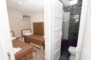 Ett badrum på NM Butik Hotel