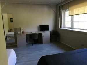 TV a/nebo společenská místnost v ubytování Hotel Igeretxe