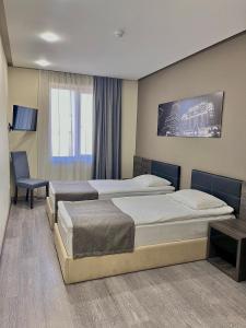 Postel nebo postele na pokoji v ubytování Bien hotel