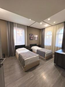 Postel nebo postele na pokoji v ubytování Bien hotel