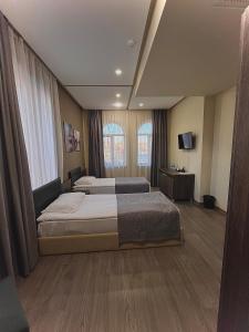 Postel nebo postele na pokoji v ubytování Bien hotel
