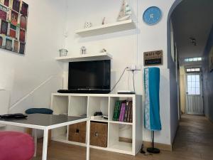 TV a/nebo společenská místnost v ubytování Casa Claudia