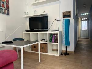 TV a/nebo společenská místnost v ubytování Casa Claudia