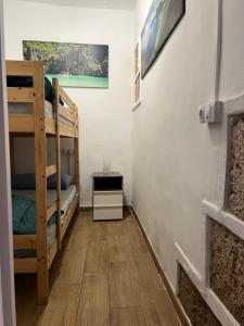 Postel nebo postele na pokoji v ubytování Casa Claudia