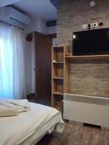 Postel nebo postele na pokoji v ubytování Lela