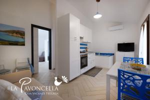 Μια τηλεόραση ή/και κέντρο ψυχαγωγίας στο Case Vacanze La Pavoncella