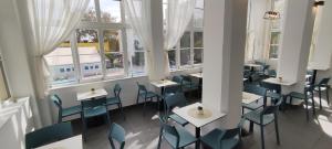 Reštaurácia alebo iné gastronomické zariadenie v ubytovaní Budapest Csaszar Hotel