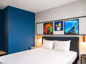 Ibis Styles Abidjan Plateau客房内的一张或多张床位