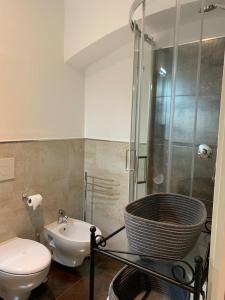 a bathroom with a shower and a toilet and a sink at Belvedere in Perugia +15 photos