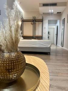 Postel nebo postele na pokoji v ubytování Enzo rooms & apartment Blloku
