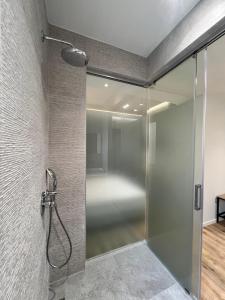 Koupelna v ubytování Enzo rooms & apartment Blloku