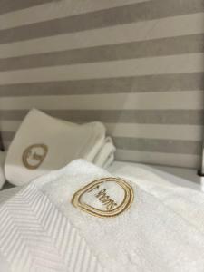 Postel nebo postele na pokoji v ubytování Enzo rooms & apartment Blloku