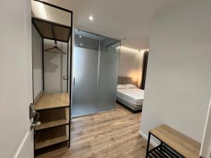 Postel nebo postele na pokoji v ubytování Enzo rooms & apartment Blloku
