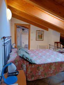 Postel nebo postele na pokoji v ubytování Bed & Breakfast Lucy