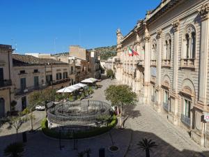 a view of a street in a city with buildings at Casa Barú Scicli in Scicli