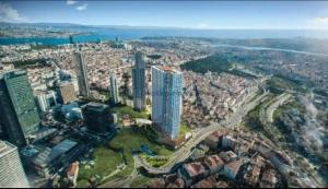 an aerial view of a city with tall buildings at A luxurious 1+1 apt at Sinpaş Queen Bomonti f-16 in Istanbul