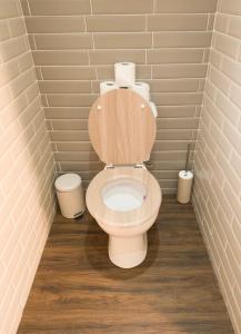 a bathroom with a toilet with the lid up at Principality Suites - Two Bed Apartment by Property Promise in Cardiff