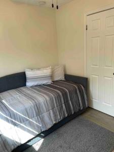 Ένα ή περισσότερα κρεβάτια σε δωμάτιο στο The Tranquility