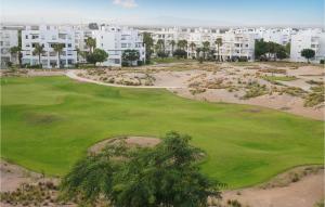 an aerial view of a golf course at a resort at Casa Fairview in Balsicas