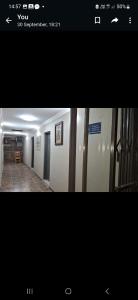 una imagen de un pasillo de un edificio con una habitación en Tsakane View Guesthouse en Brakpan