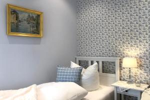 Postel nebo postele na pokoji v ubytování Villa Svanen am Meer