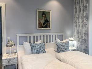 Postel nebo postele na pokoji v ubytování Villa Svanen am Meer