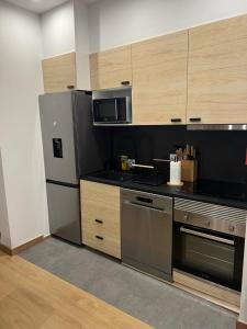 A cozinha ou cozinha compacta de Francisca City House
