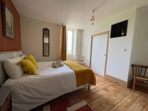 Posteľ alebo postele v izbe v ubytovaní La Porte des Prés