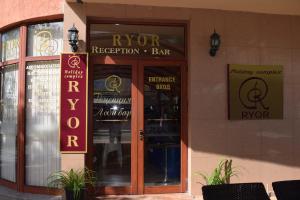 a store front of a restaurant with a revolving door at Apartment 24, RYOR in Sunny Beach