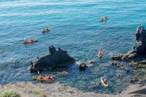 a group of people in boats in the water at Studio Chaleureux au Cap d’Agde in Cap d'Agde