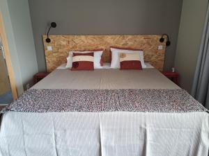 Postel nebo postele na pokoji v ubytování Poço e Meio